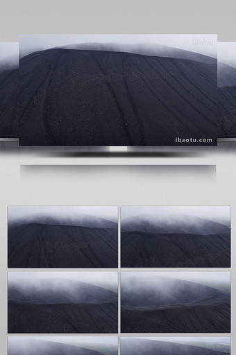 大气震撼风4K实拍航拍烟雾环绕的黑色火山图片