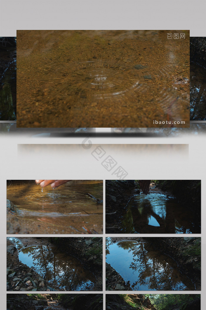 实拍雨季森林泉水小溪水面倒影水滴滴落视频