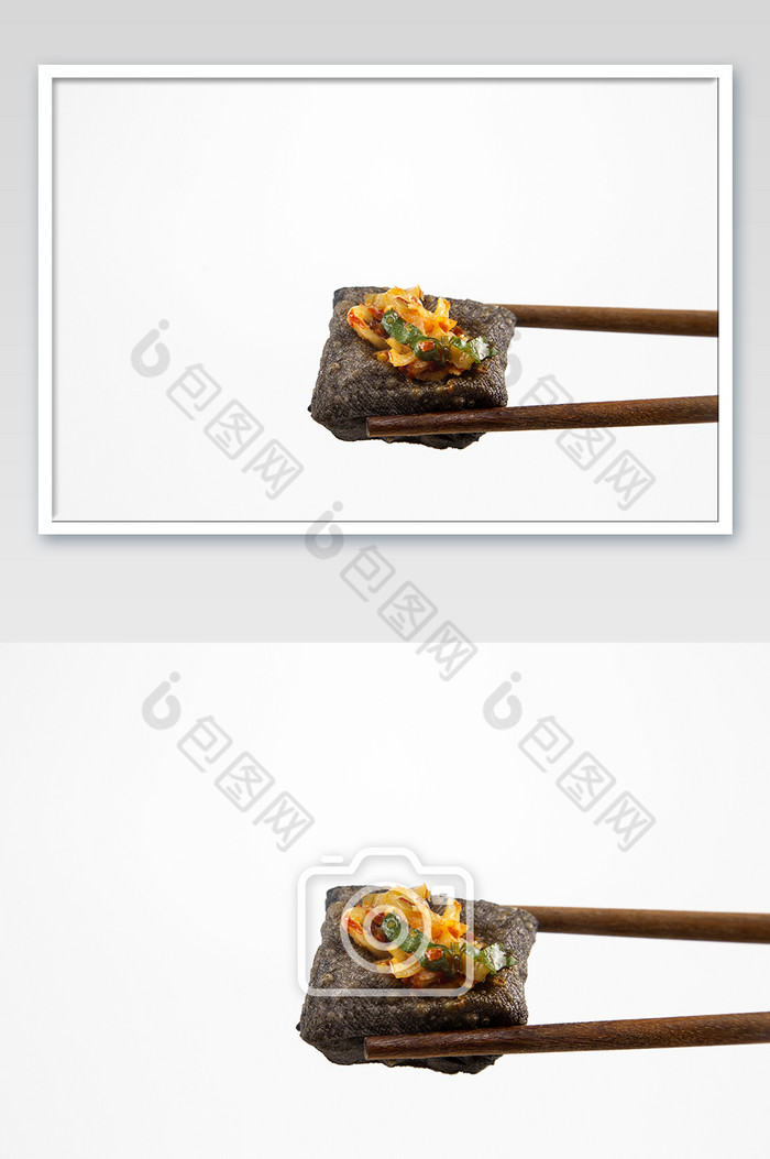 用筷子夹着的臭豆腐特写图片图片