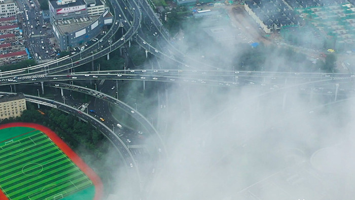 航拍南京城市赛虹桥高架云雾穿梭透视