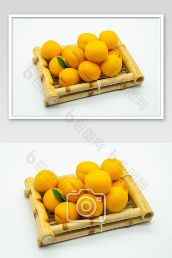 竹盘里的黄杏水果图片