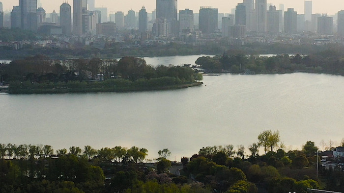 航拍南京城市大景交通玄武湖黄昏国展中心