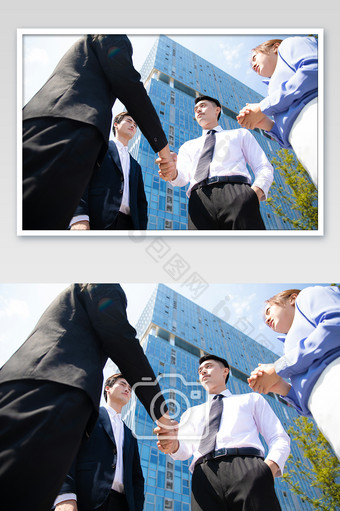 商务西装男女握手合作高楼大厦摄影图图片