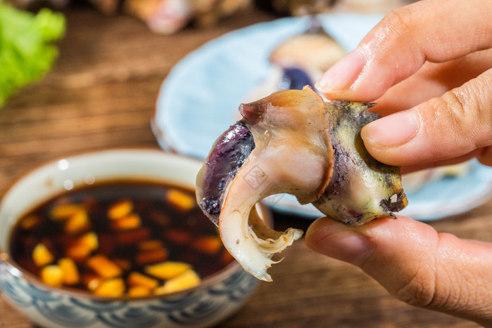 海鲜海螺肉摄影图图片