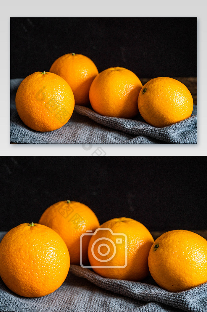 灰色桌布上的新鲜橙子图片图片