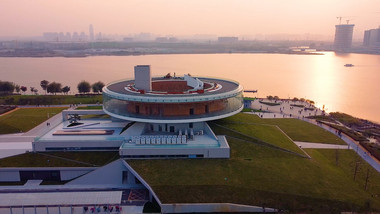 航拍郑州公共艺术中心夕阳北龙湖艺术建筑