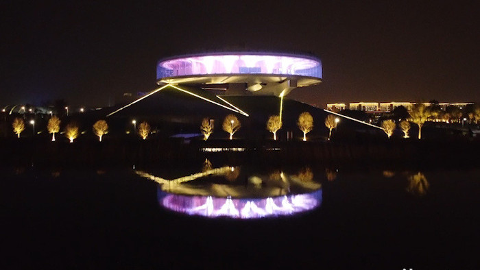 航拍郑州公共艺术中心夜景建筑艺术