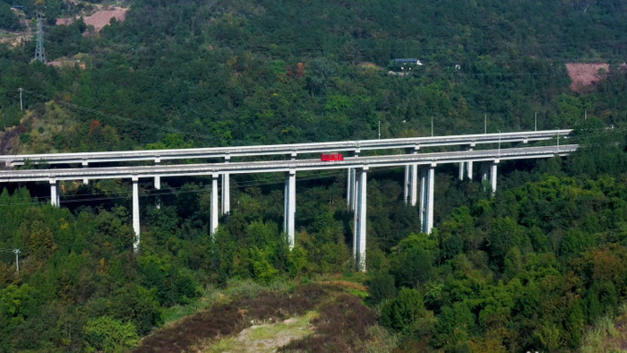 4K航拍山区高速公路双通道隧道口