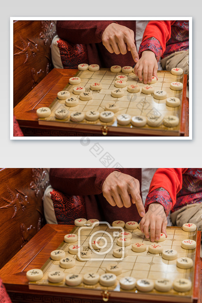 新生爸爸教儿子下象棋近景片