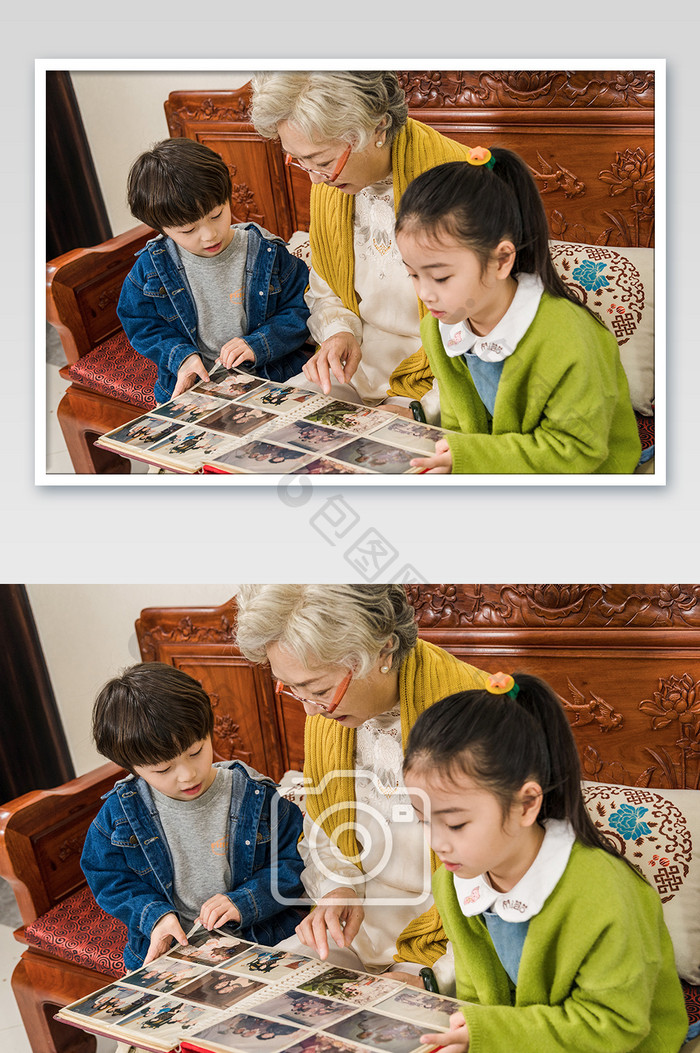 新年奶奶带孙子孙女看相册摄影图片