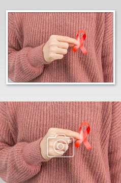 手持红丝带关爱艾滋公益广告宣传