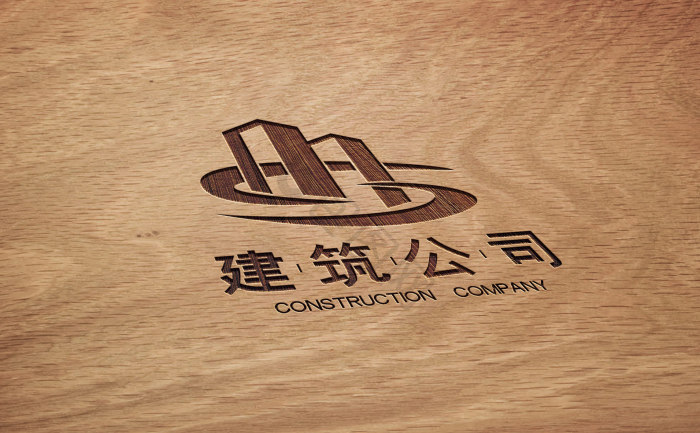 木纹桌面上的雕刻logo模板-包图网