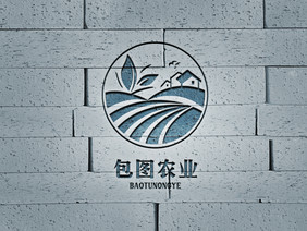 蓝灰色砖墙上的雕刻logo样机