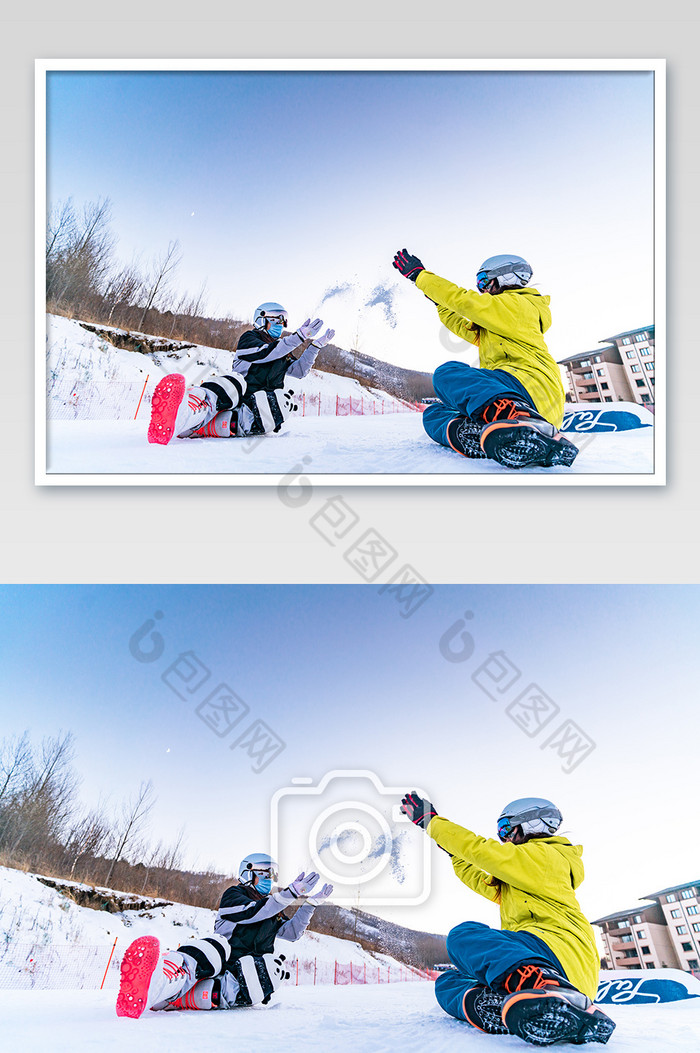 身穿滑雪服在雪地打雪仗图片图片