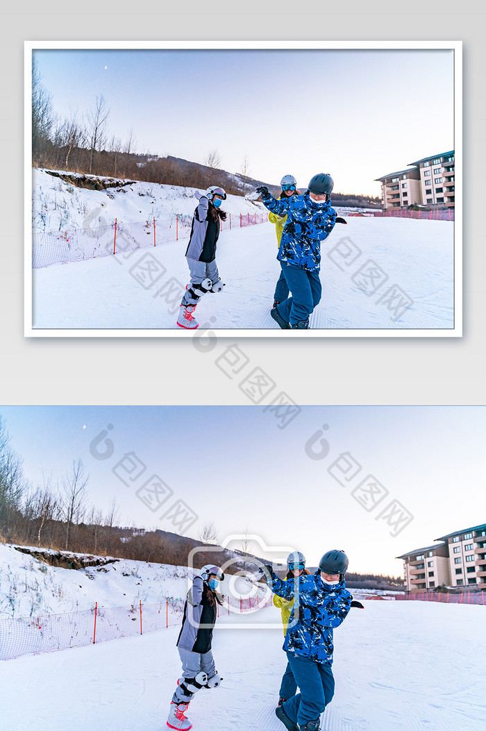 两个身穿滑雪服的人雪地打雪仗图片图片