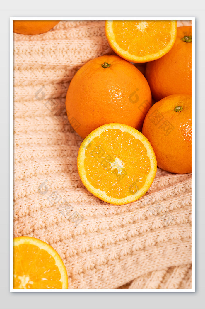 橙子水果切开的水果温暖氛围摄影图图片图片