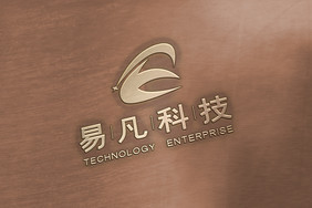 古铜色背景上的金色渐变logo样机