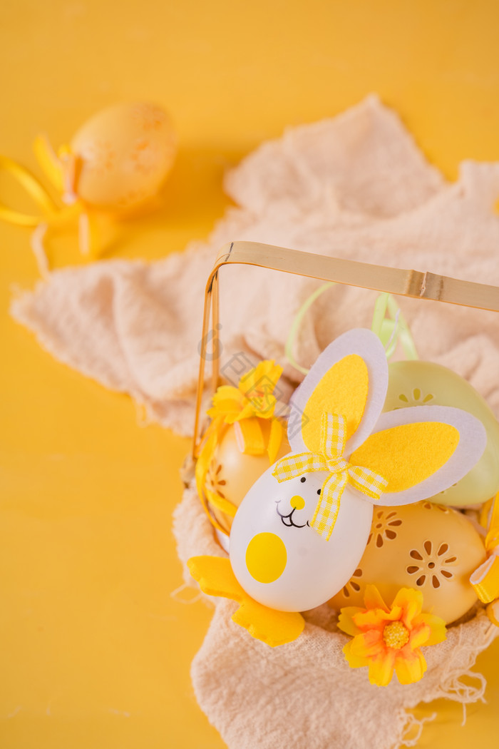 黄色可爱复活节复活蛋兔子摄影图图片