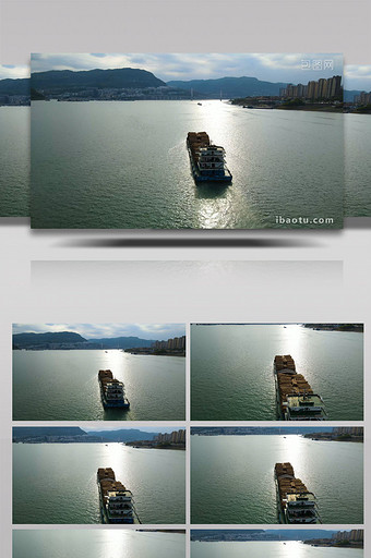 4K航拍长江轮船运送木头砍伐木料图片