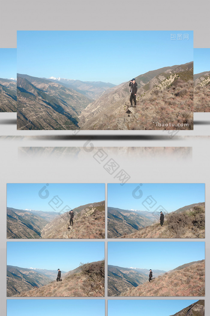 4K实拍小伙子站在山上眺望远处视频素材