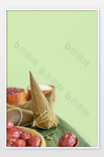 端午节美食粽子绿色背景图片