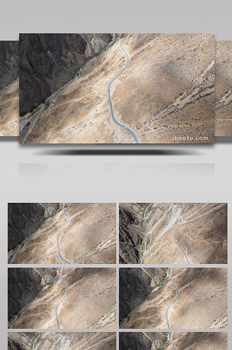 4K航拍车辆行驶在峡谷陡峭山路图片