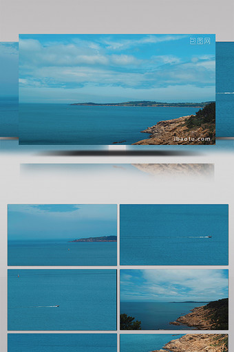 实拍海边蓝天白云延时摄影海上小船海岸礁石图片