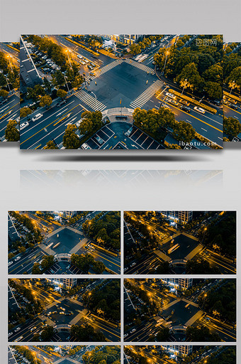 交通城市大气日转夜十字路口车流延时航拍图片