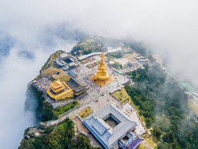 航拍四川峨眉山地标金顶佛像建筑摄影图片