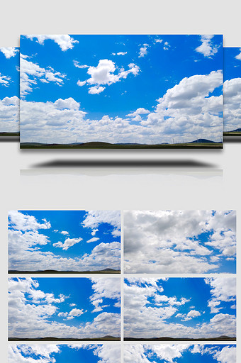 4k延时拍摄白云飘移下的草原和大风车图片