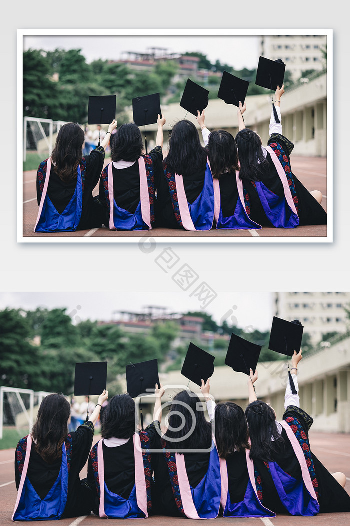 大学毕业生在跑道上举着学士帽