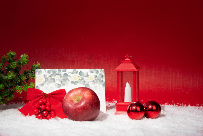 圣诞节圣诞彩铃蜡烛苹果红浆果图片