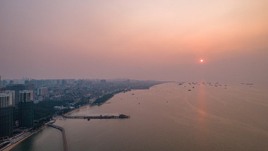 城市大气海边日落夕阳航拍延时