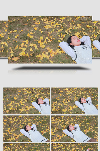 人物形象女孩躺在银杏树下休憩图片