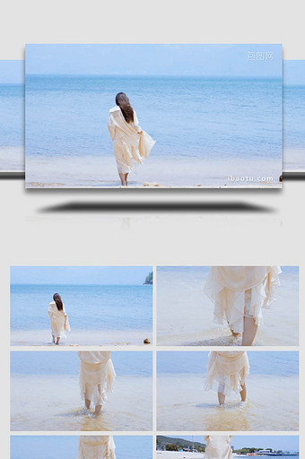海边的女孩背影沙滩海水4K实拍图片