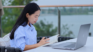 东方人像女孩户外学习看书实拍