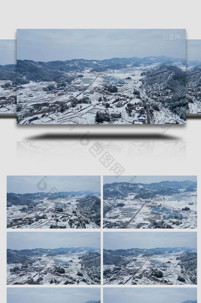 山脚下乡村农田雪景航拍