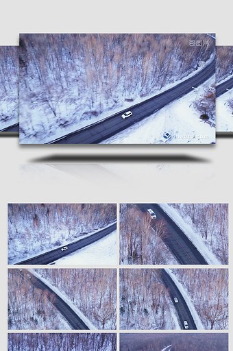 冬季雪地森林道路行驶的汽车航拍图片
