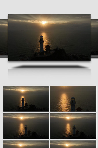 海南东方鱼鳞洲海边夕阳灯塔航拍图片