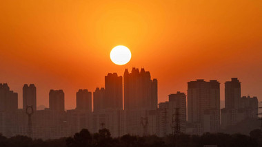 城市楼房日落夕阳风光延时