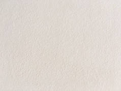 蹩脚画墙纹理为背景。开裂的混凝土老式墙背景, 旧的白色彩绘墙。背景白色绘画.