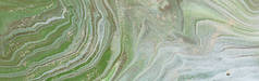 抽象大理石效果背景的摄影。绿色和白色创意颜色。美丽的油漆