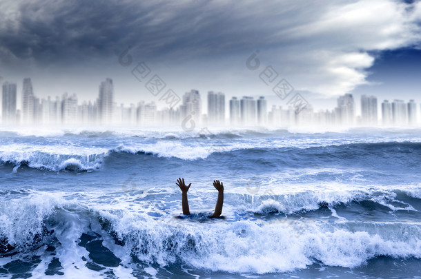 全球气候变暖和极端天气的概念。在溺水的人