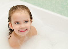 Little girl is taking a bath