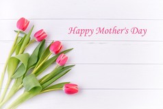 母亲的一天。母亲送花。母亲一天卡与郁金香。母亲节的的粉红色郁金香。母亲一天背景和母亲之花。Mothersday 的礼物.