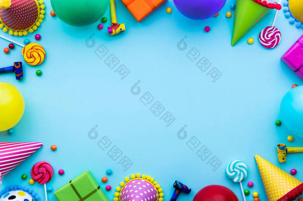 生日聚会的背景与党的帽子和糖果