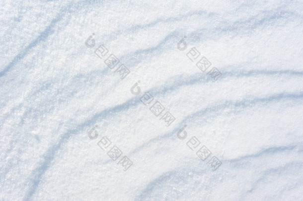 明亮的条纹的雪作为背景