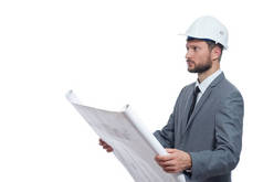 建筑师在安全帽控股的建筑平面图.