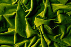 绿色天鹅绒纺织品的背景
