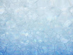 水上的许多泡沫蓝色纹理肥皂泡抽象背格